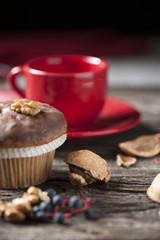 Walnuts muffins on a wooden table