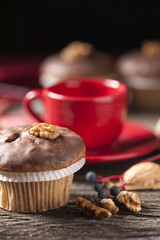 Walnuts muffins on a wooden table