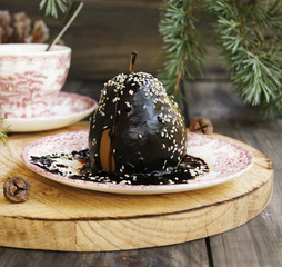 Christmas dessert pear with chocolate