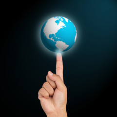 Earth globe icon on hand