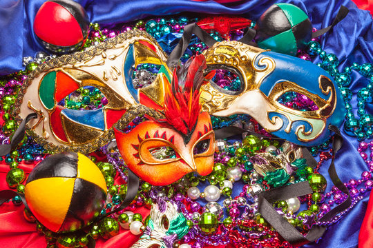 Three Mardi Gras Masks and Beads