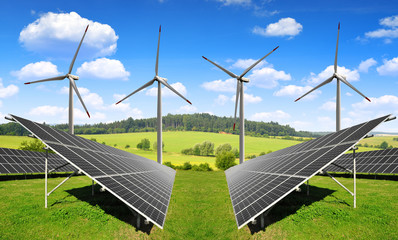 Solar energy panels with wind turbines