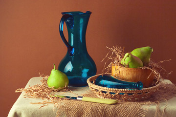 Still life with pears and blue jug