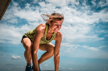 Young woman doing pose arm balance
