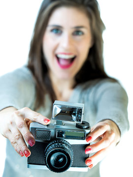 Girl with vintage camera plastic