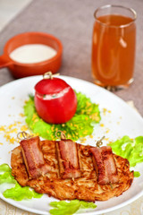 veal meat with bacon