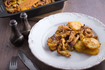 roasted potatoes with chicken closeup