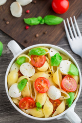 Pasta with mozzarella and tomato