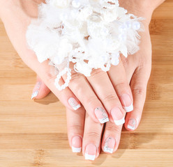 Fototapeta premium Female soft hands with beautiful french manicure