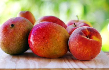 Fototapeta na wymiar Peach and mango fruits