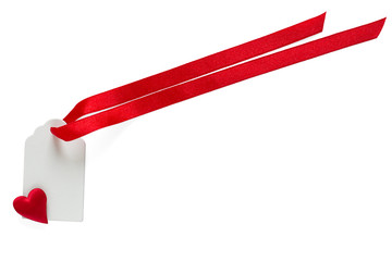 Blank label with  satin ribbon and heard