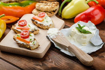 Healthy baguette, spread curd cheese with vegetable and herbs