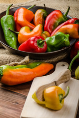 Slicing peppers with wood knife