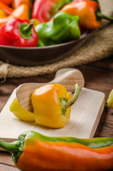 Slicing peppers with wood knife
