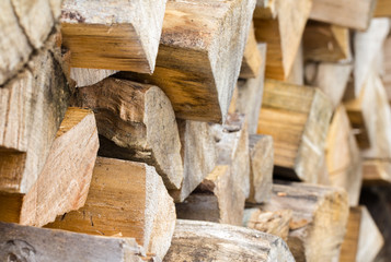 Stacked split firewood close up