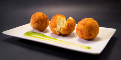 Creamy and smooth fried croquettes. Typical Spanish tapa.