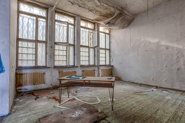 Demolished room with wooden floors