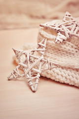 Christmas star on wicker background knitted