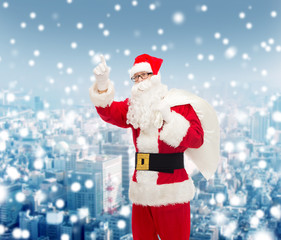 man in costume of santa claus with bag