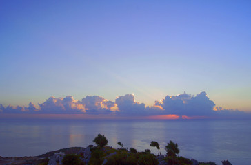 Sunrise over the Mediterranean Sea on the island of Rhodes .