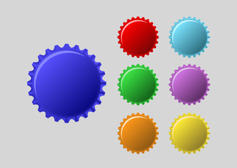 bottle caps in colors isolated on white background