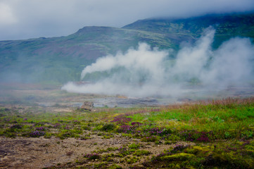 Fototapeta na wymiar Famous Icelandic Geyser Geysir Strokkur Erupting in Iceland