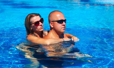 Loving couple in pool