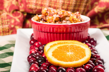 Fresh cranberries with orange slices