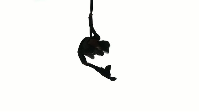 Woman dancer on aerial silk, aerial contortion, aerial ribbons,