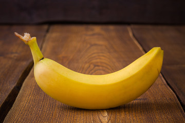 Banana fruit on dark wooden table © avirid