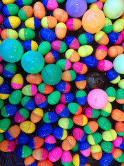 Fototapeta na wymiar Background, colorful plastic balls in the pool