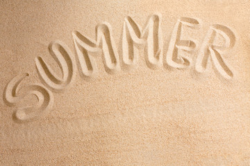 Word summer written by in the sand, background