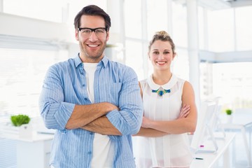 Fototapeta premium Smilling photo editor posing with arms crossed