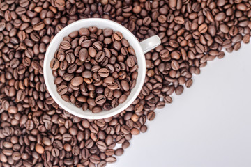 coffee mug on the background of coffee beans