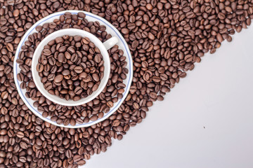 coffee mug on the background of coffee beans