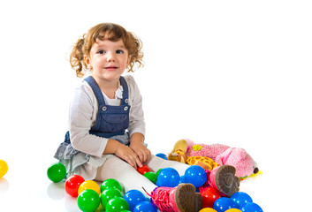 Obraz premium Girl around colored balls