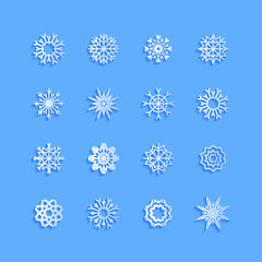 Blue snowflakes and shadow on white background. art