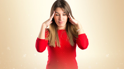 Young girl thinking over isolated white background