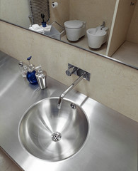 detail of  steel washbasin in a modern bathroom