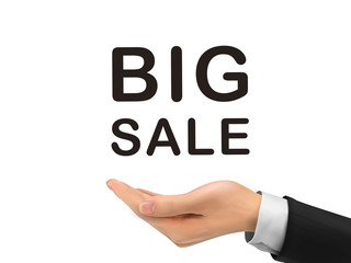 big sale words holding by realistic hand