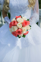 bride holding a wedding bouquet. Wedding flowers closeup