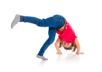 Blonde little girl jumping