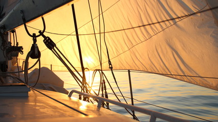 beautiful sun-filled sails at dawn - 74185349