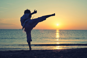 Young boy in karate uniform