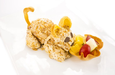 ice cream in the shape of a cat with fruit salad