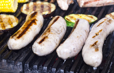 cooking sausages on the grill in the restaurant