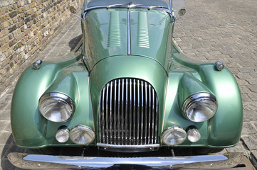 Front view of a green classic car