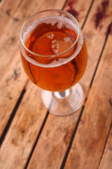 Glass of beer in a crate