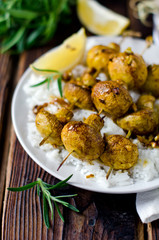 Skewers of mushrooms with a side dish of rice