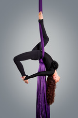 Beautiful dancer on aerial silk, aerial contortion, aerial ribbo